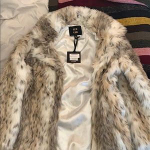 Cream light leopard faux fur coat. New with tags